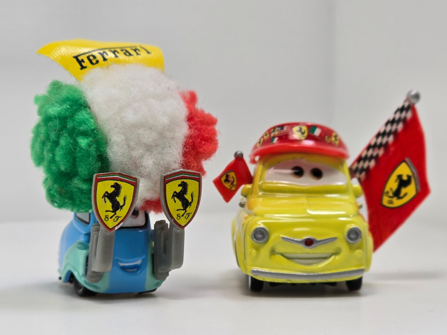 DISNEY PIXAR CARS - LUIGI & GUIDO FERRARI FANS - PRE OWNED