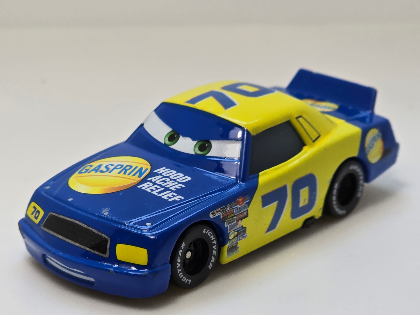 DISNEY PIXAR CARS - FLOYD MULVIHILL #70 GASPIRIN - " HOOD ACHE RELIEF" - PRE OWNED