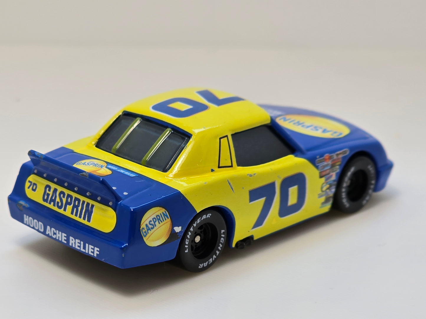 DISNEY PIXAR CARS - FLOYD MULVIHILL #70 GASPIRIN - " HOOD ACHE RELIEF" - PRE OWNED