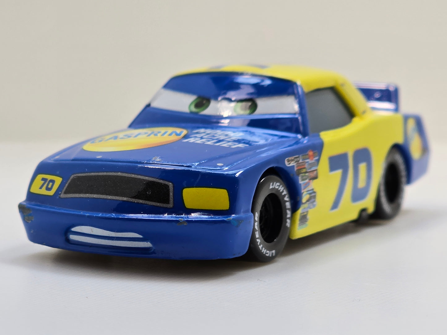 DISNEY PIXAR CARS - FLOYD MULVIHILL #70 GASPIRIN - " HOOD ACHE RELIEF" - PRE OWNED
