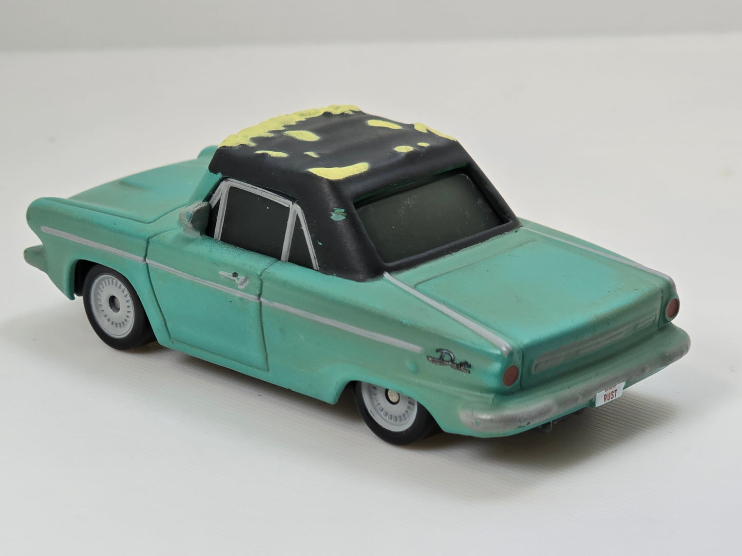 DISNEY PIXAR CARS - RUSTY RUST-EZE - TEAM OWNER - PRE OWNED