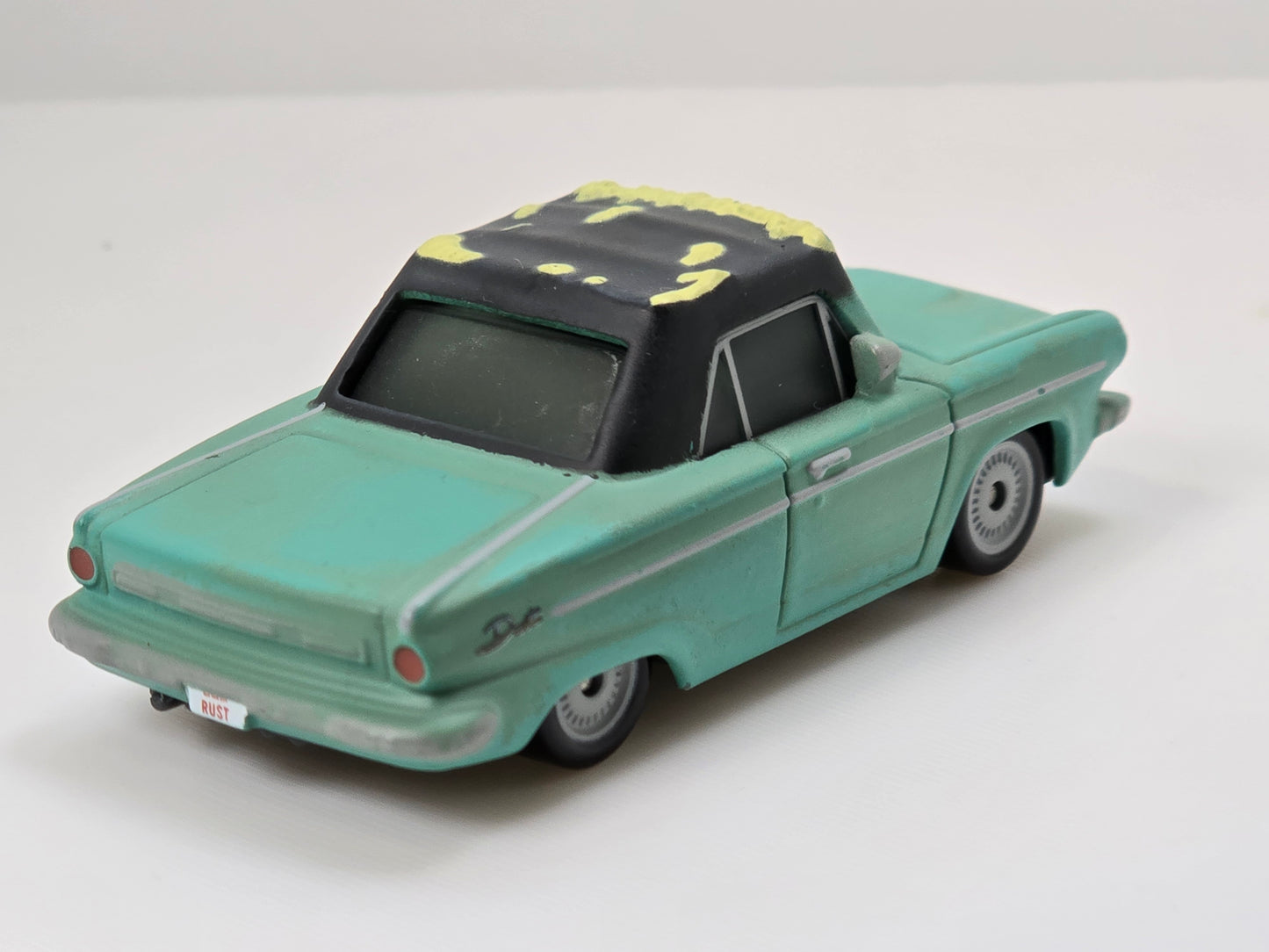 DISNEY PIXAR CARS - RUSTY RUST-EZE - TEAM OWNER - PRE OWNED