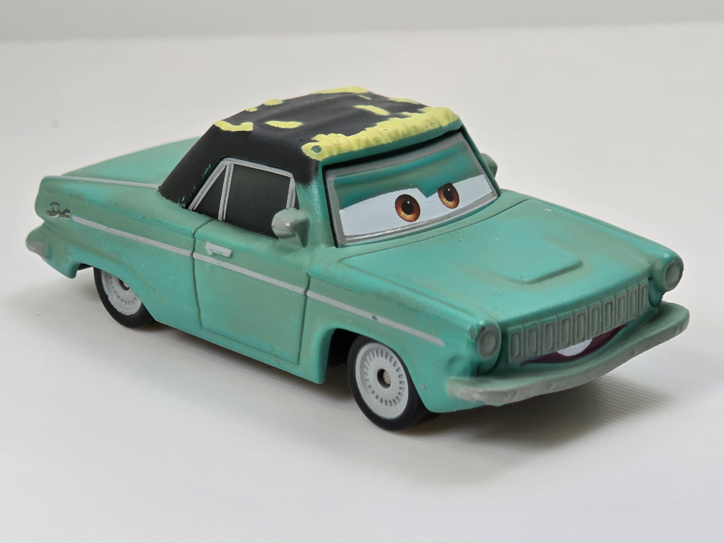 DISNEY PIXAR CARS - RUSTY RUST-EZE - TEAM OWNER - PRE OWNED