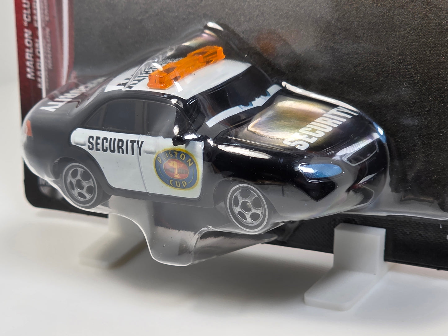 DISNEY PIXAR CARS - MARLON "CLUTCHES" McKAY - PISTON CUP SECURITY