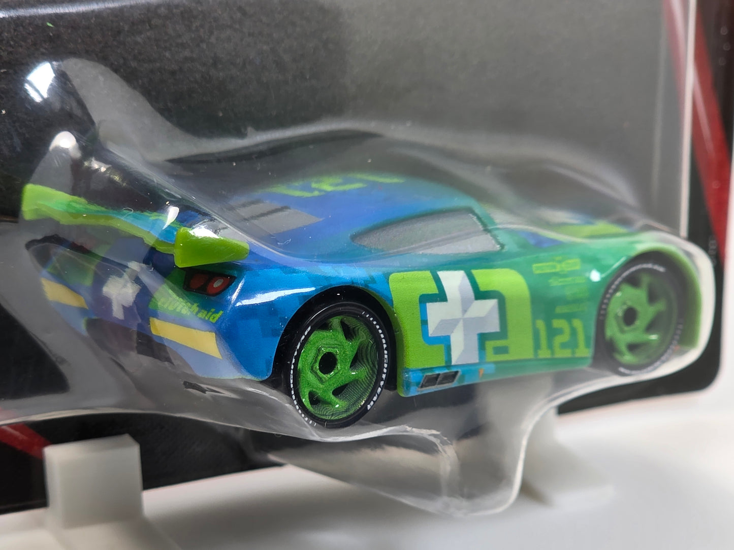 DISNEY PIXAR CARS - NOAH GOCEK #121 - CLUTCH AID - NEXT GEN RACER - 20th ANNIVERSARY