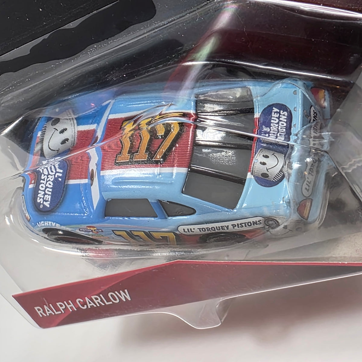 DISNEY PIXAR CARS -RALPH CARLOW #117 - LIL' TORQUEY PISTON - NEW