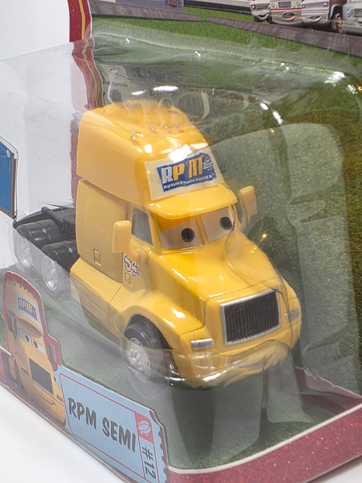 DISNEY PIXAR CARS - THE WORLD OF CARS - RPM SEMI - YELLOW - 2009 - NEW