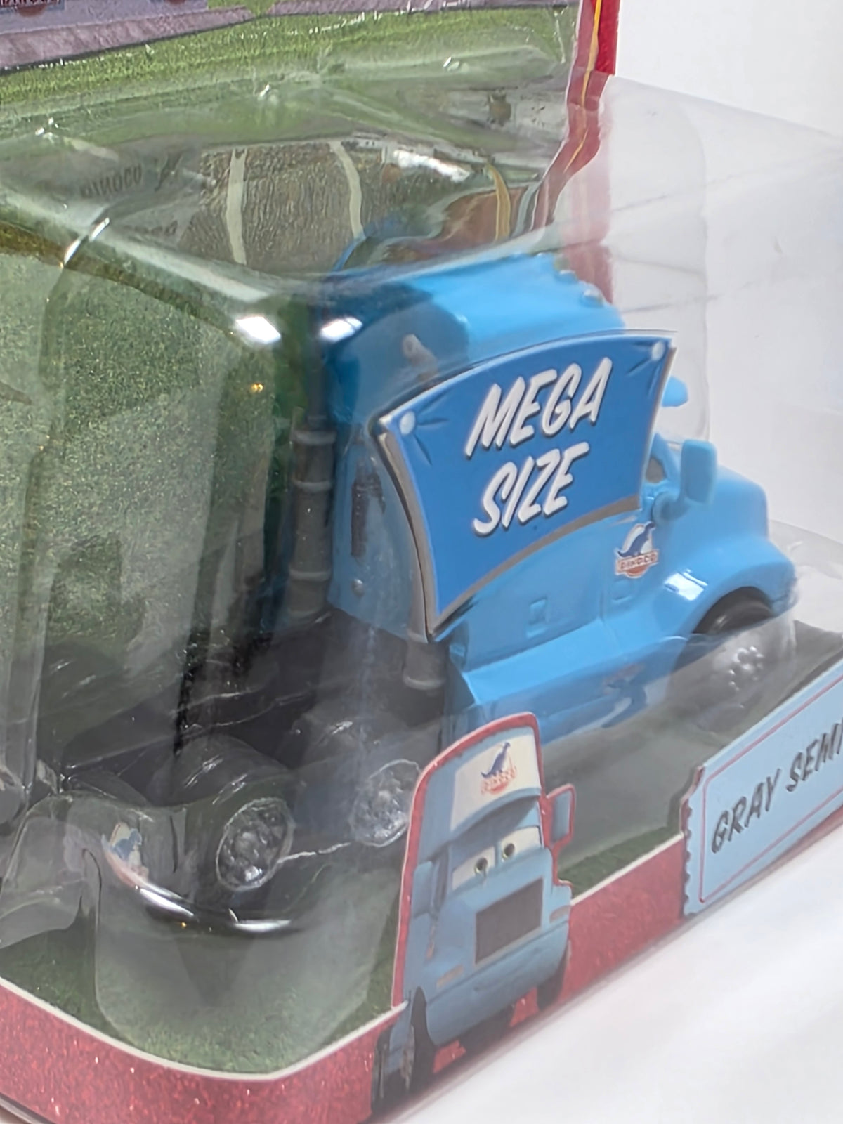 DISNEY PIXAR CARS - THE WORLD OF CARS - DINOCO "GRAY"  SEMI - BLUE - 2009 - NEW