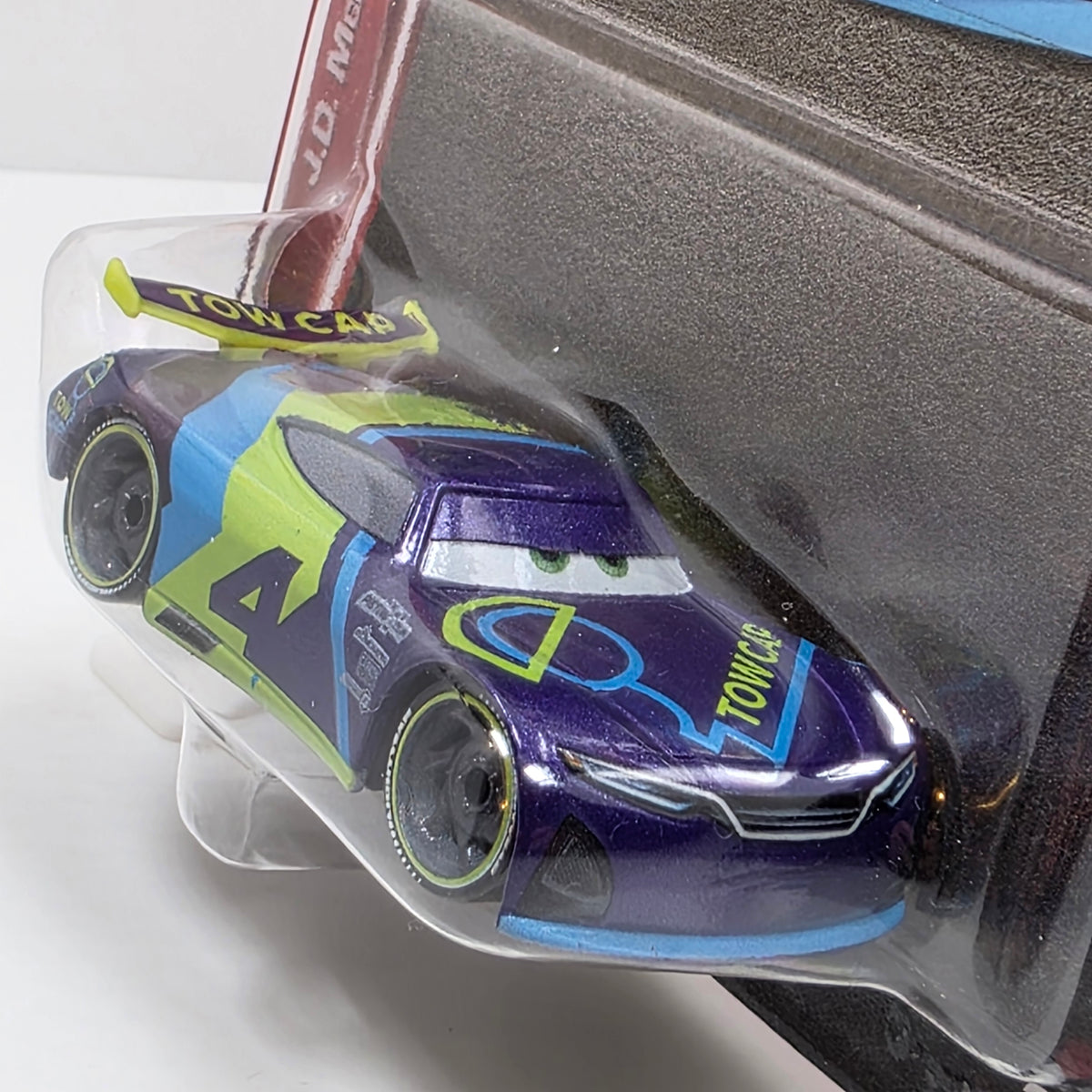DISNEY PIXAR CARS - J D MCPILLAR #4 - TOW CAP - NEXT GEN RACER - NEW